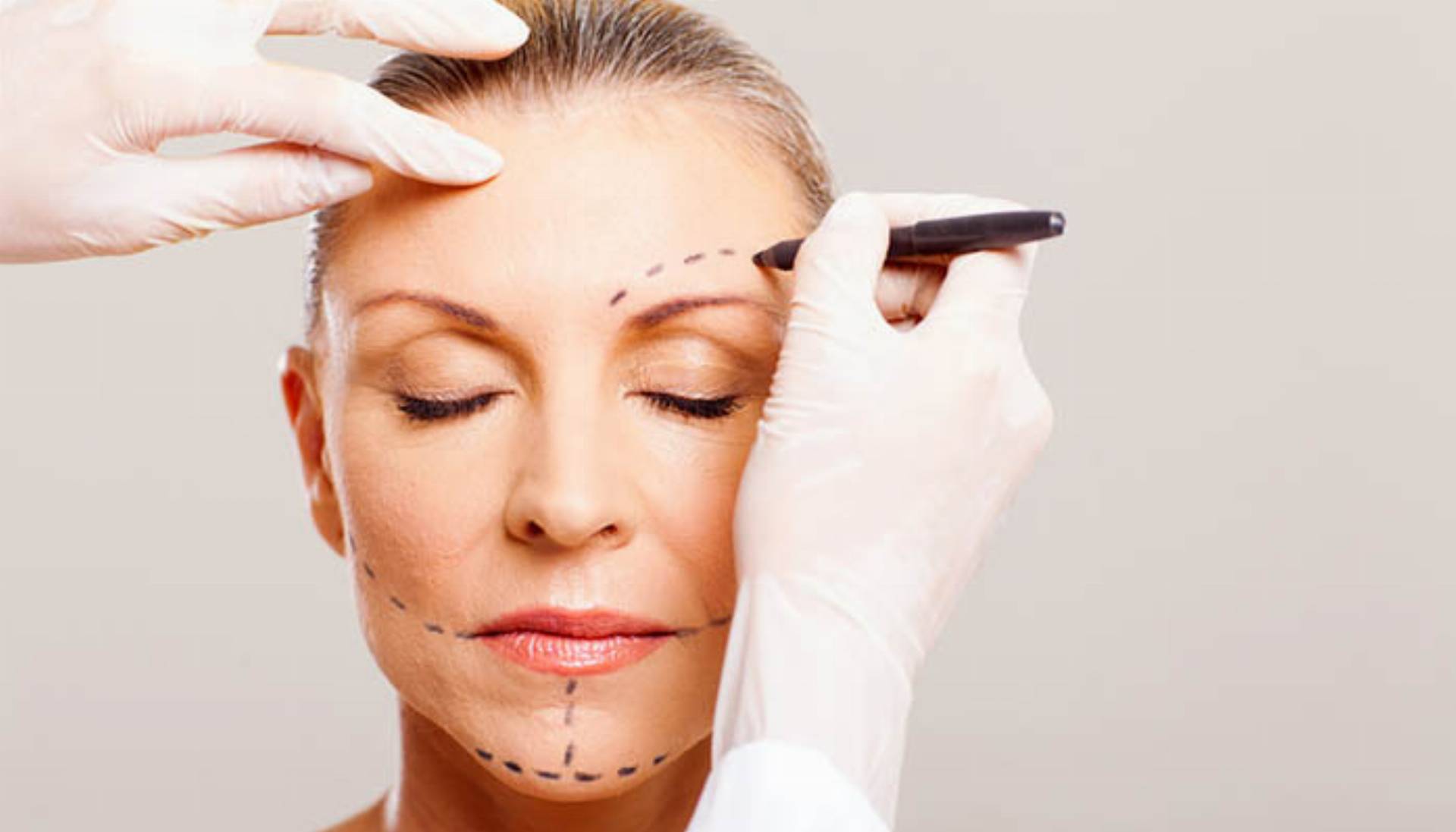 senior woman with correcting marks