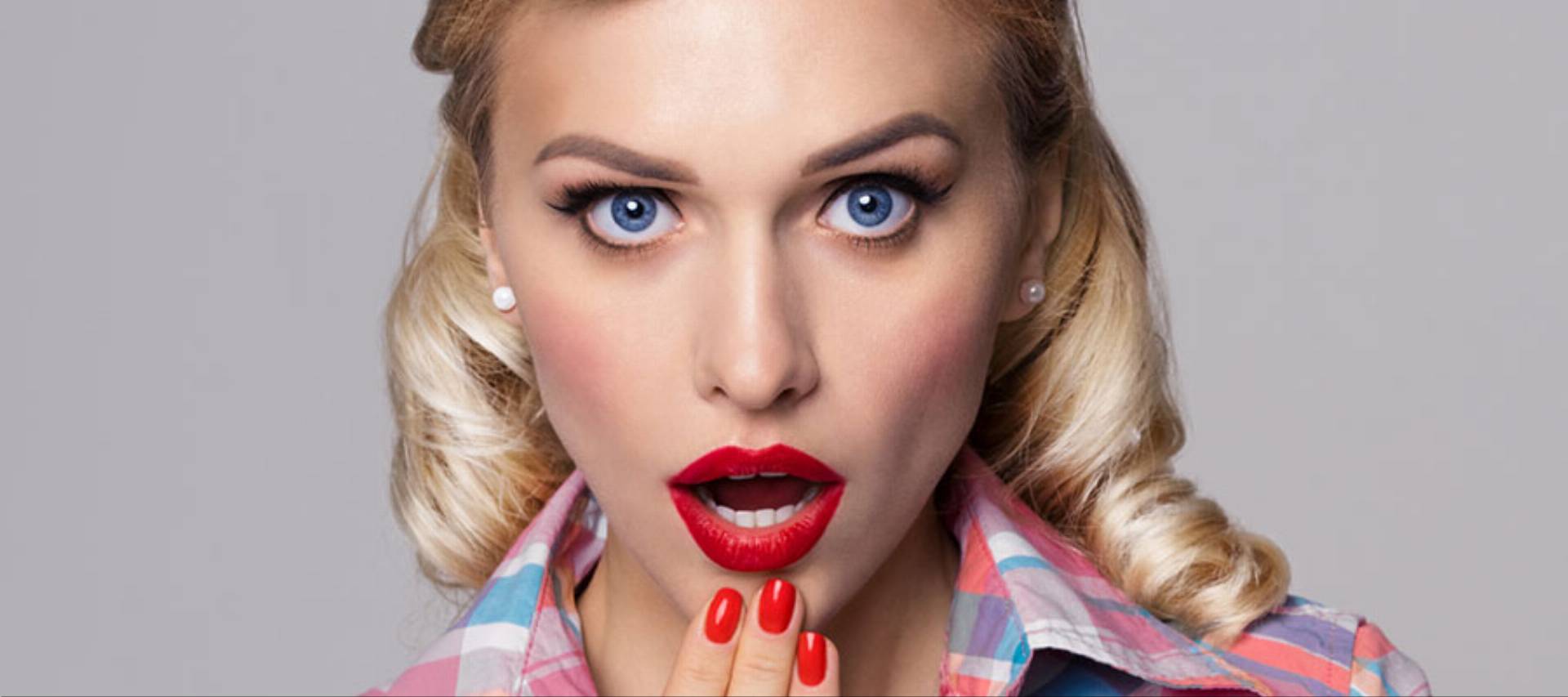 young surprised woman, dressed in pin-up style